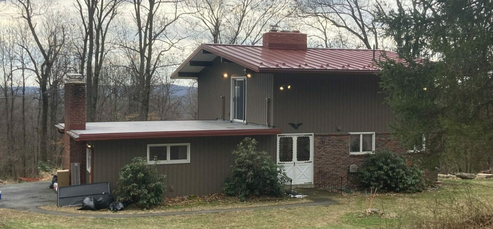 ABS Metal Roof, Color: Colonial Red, Red Seamless Gutters White Vinyl Soffit, Red Fascia, EPDM Rubber Roof on lower section, Mohnton, PA, Berks Co. PA, Installed April 2022